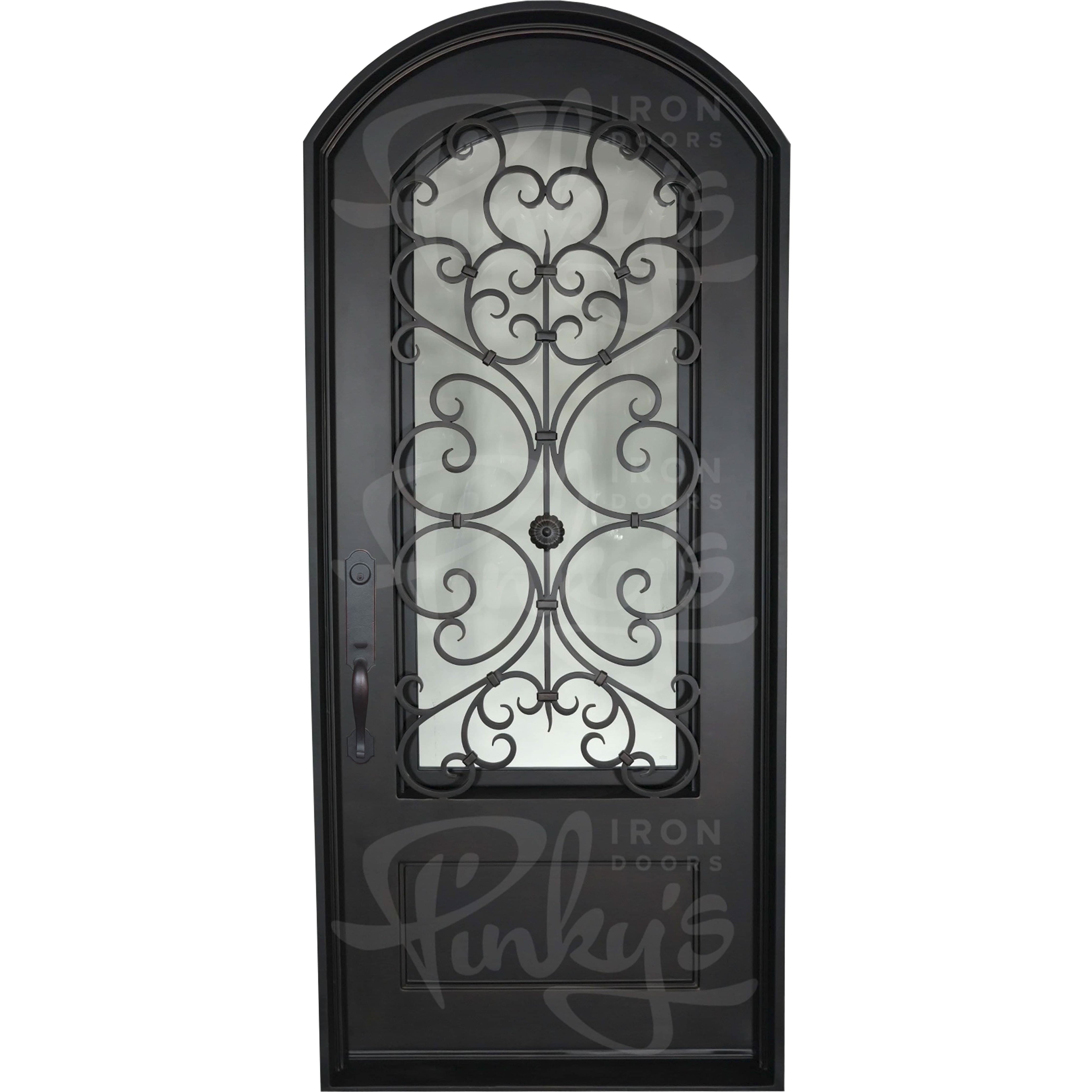 Night black exterior metal single eyebrow arch top door with decorative metalwork.