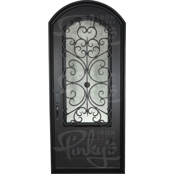 Night arch top single swing door with decorative ironwork for cold climates.