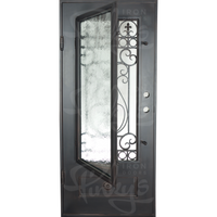 Single entryway door made from thick iron. Door has a 3/4 glass panel behind intricate iron detailing and is thermally broken to protect from extreme weather.