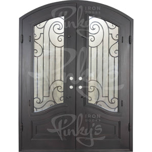 Double entryway doors made with a thick iron frame. Doors feature 3/4 glass panels behind intricate iron designs and are thermally broken to protect from extreme weather.