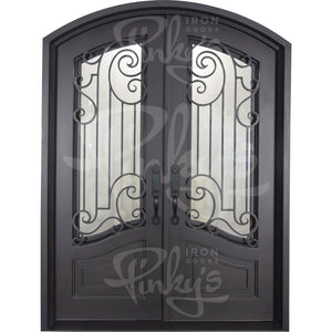 Double entryway doors with a thick iron and steel frame and a full pane of glass behind intricate iron detailing.