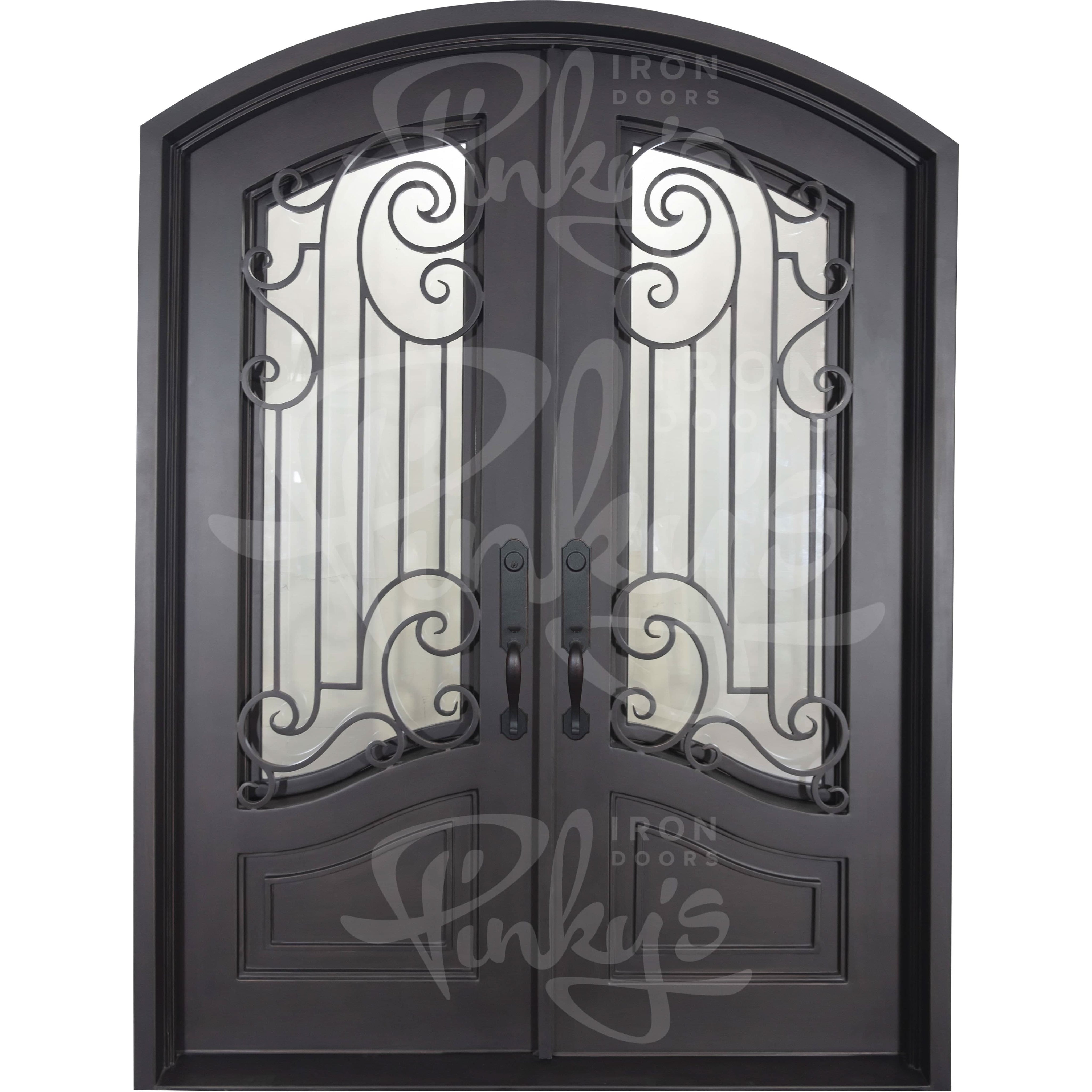 Piano metal arched top entry door with glass and thermal break in bronze.