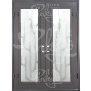 Double entryway doors with a thick iron and steel frame. Doors feature a full-length pane of glass behind iron cactus detailing on each side and are thermally broken to protect from extreme weather.