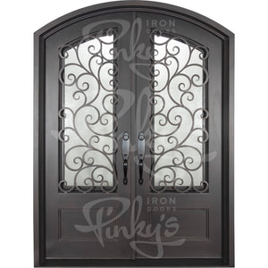 Double entryway doors made with a thick iron and steel frame. Doors feature 3/4 panel windows behind intricate iron detailing, a kickplate, and a slight arch on top. Doors are thermally broken to protect from extreme weather.